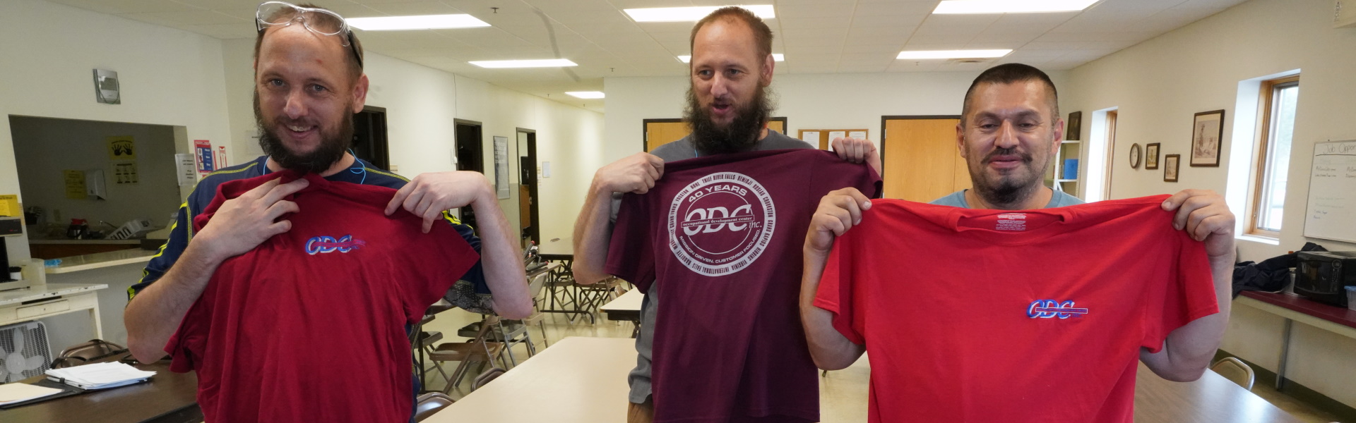 ODC team members showing off their new apparel